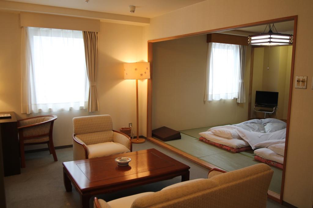 Shizunai Eclipse Hotel Shinhidaka Bagian luar foto