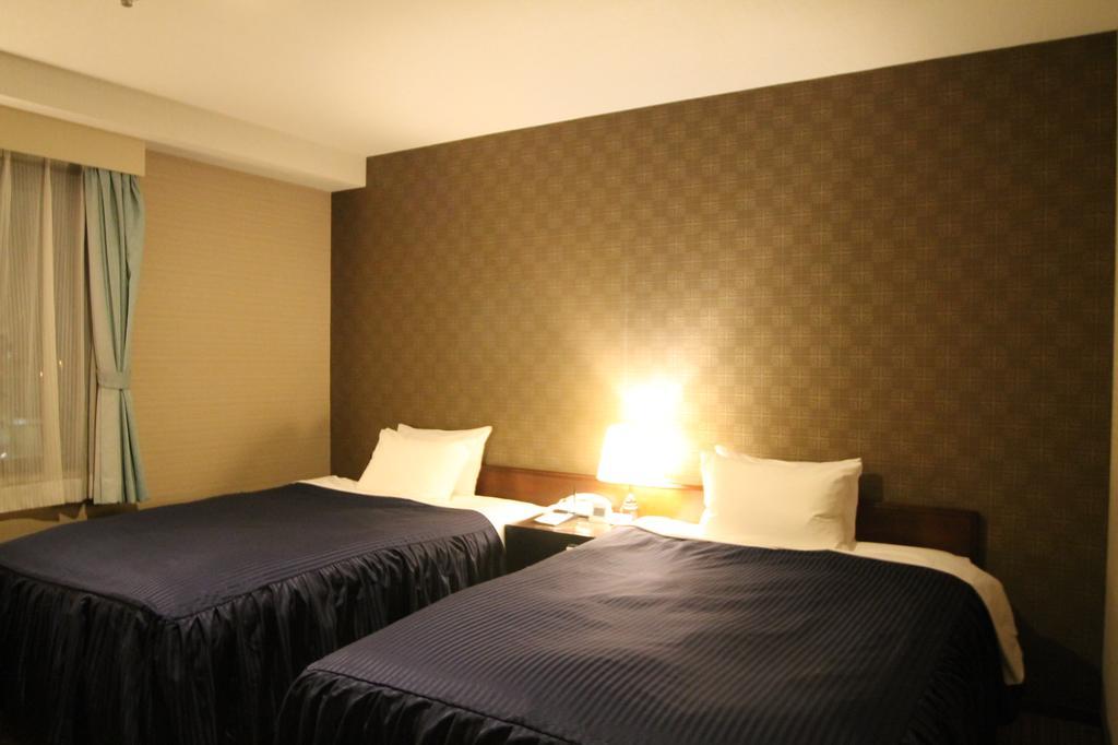 Shizunai Eclipse Hotel Shinhidaka Bagian luar foto